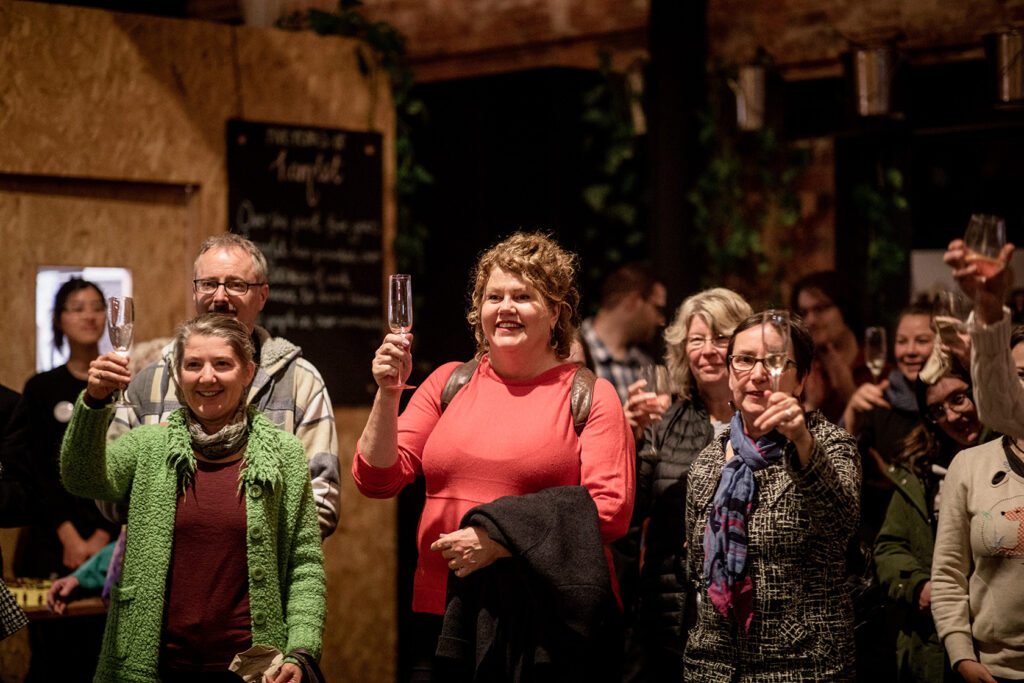 guests-raising-their-glasses-at-hamlet-event